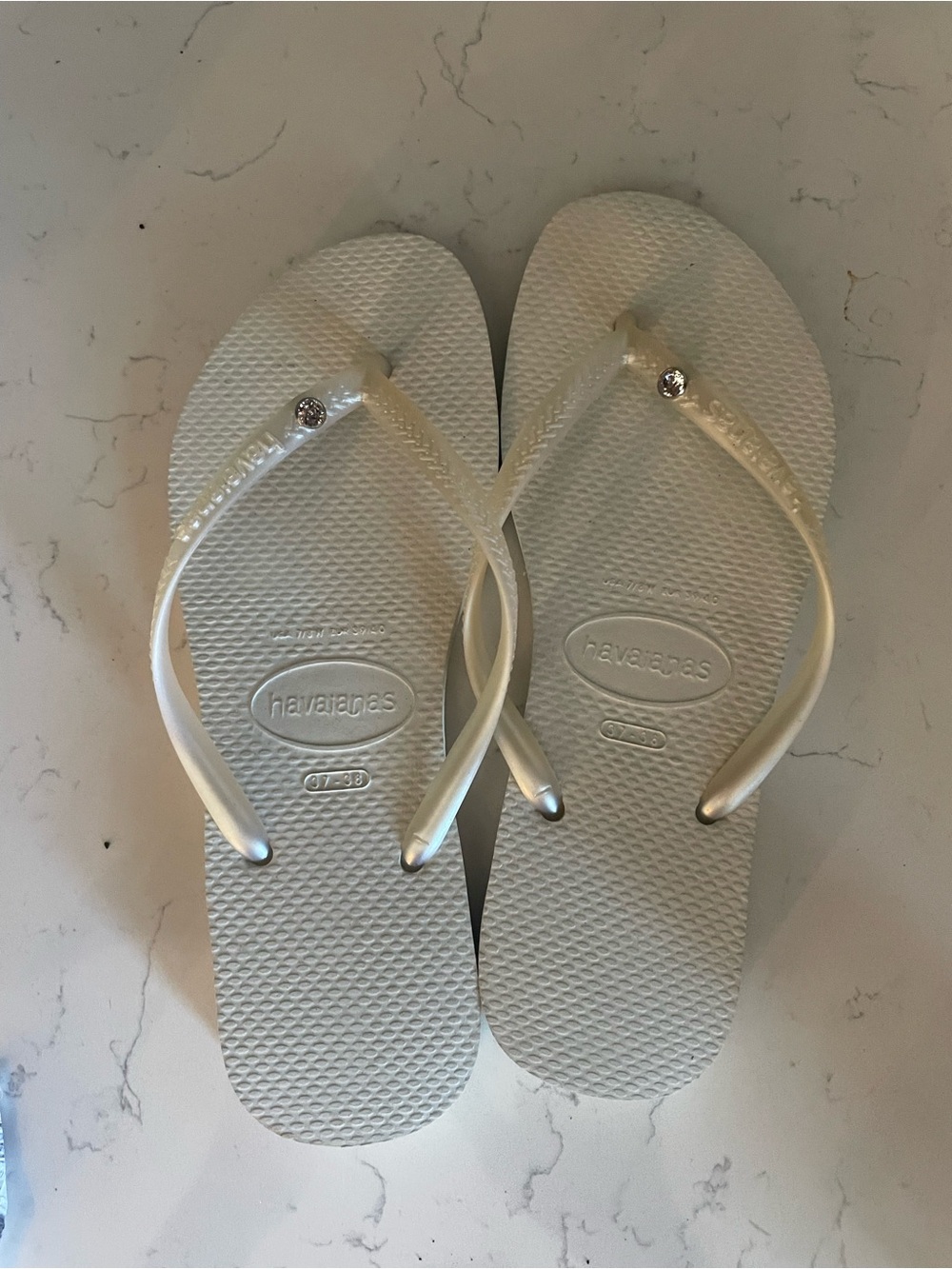Havaianas Women's Slim Flip Flops in Ivory with Crystal Rivets